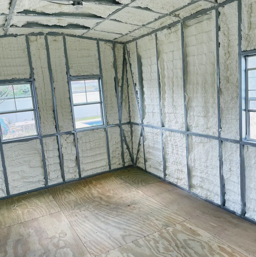 Closed-cell spray foam insulation applied to wall cavities in a residential project in Pacific